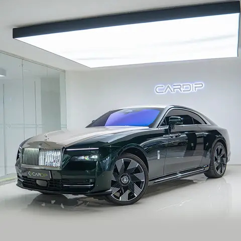 Luxury black Rolls-Royce with tinted windows displayed in a sleek, modern Cardip showroom in Dubai.