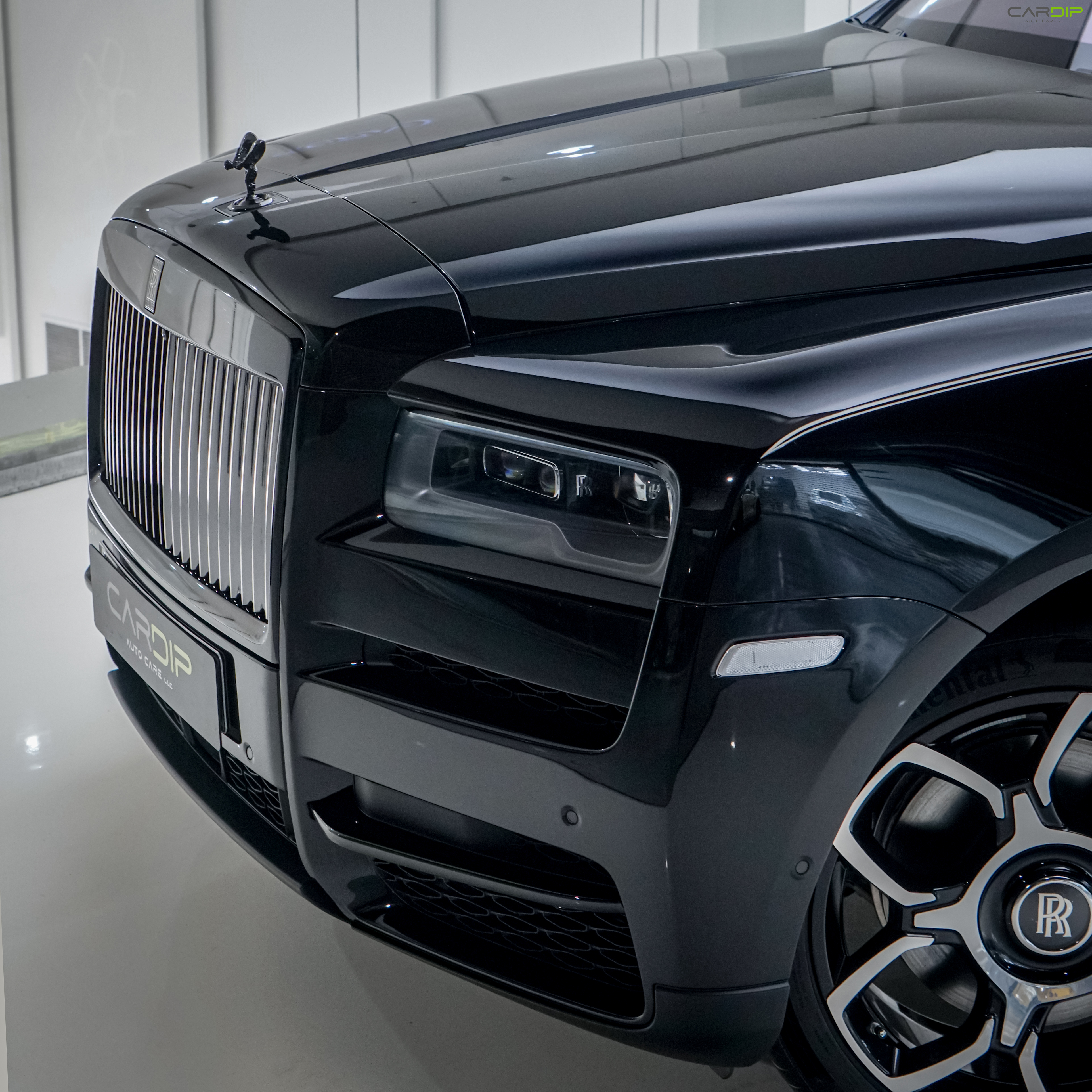 Car maintenance inside a Dubai garage.Cardip