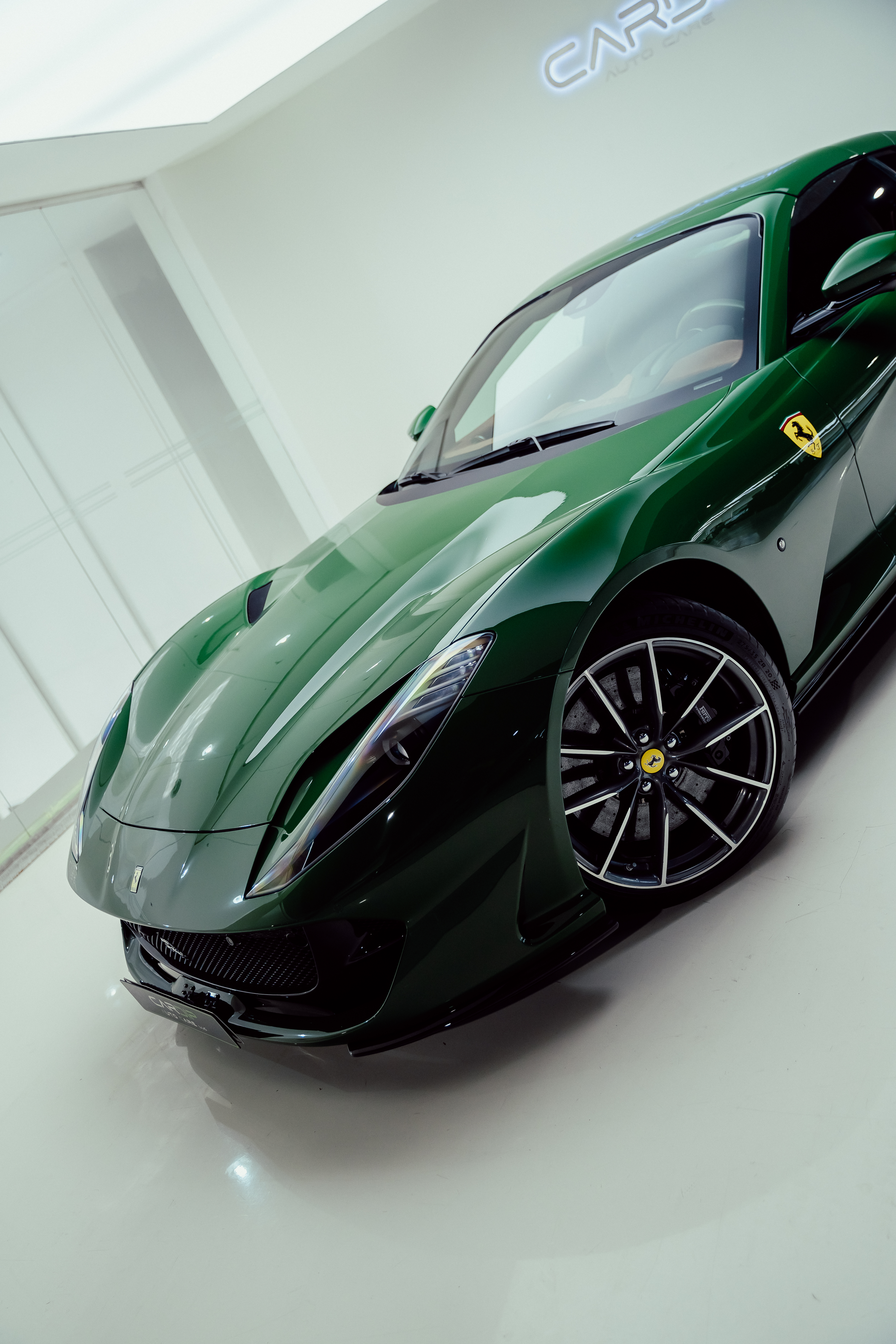 Luxury car protected with preventive paint care. Cardip